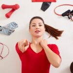 fitness items for swinging crossword clue